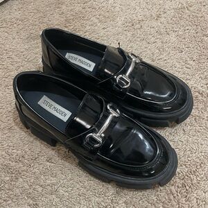 Steve Madden Glossy Black Loafers with Metallic Accent
